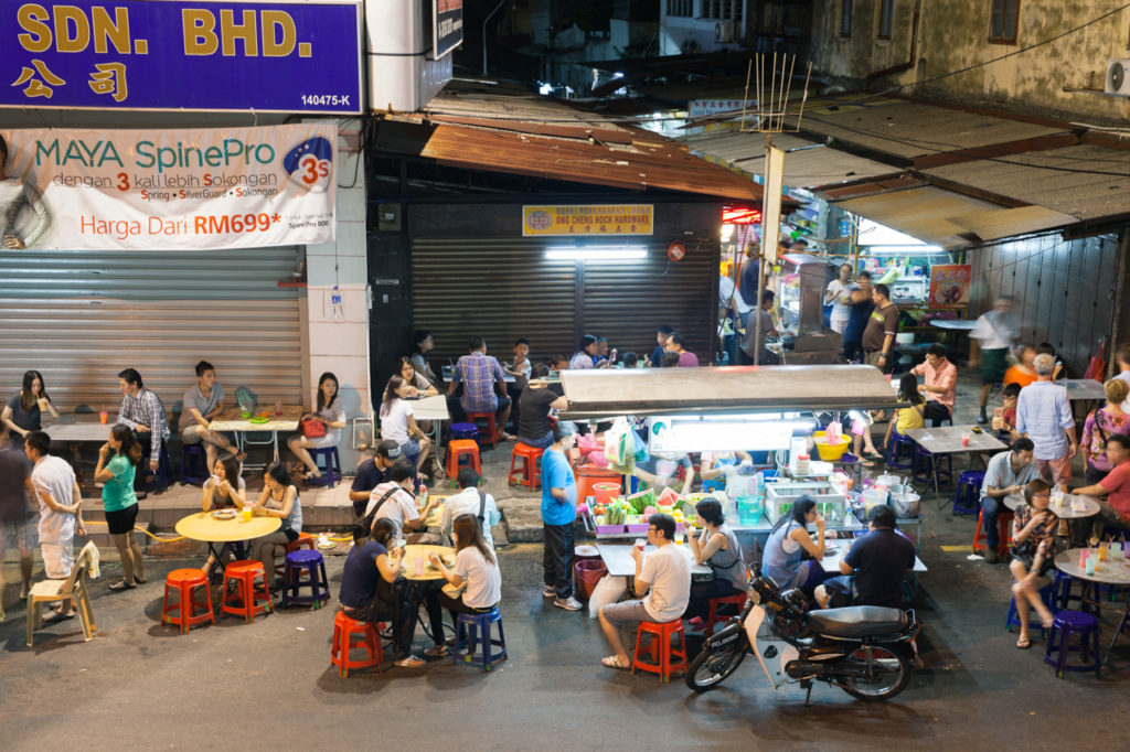 People dining at the street food stalls on Lebuh Chulia