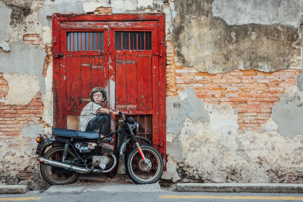 Mural "Boy on a Bike" by Ernest Zacharevic