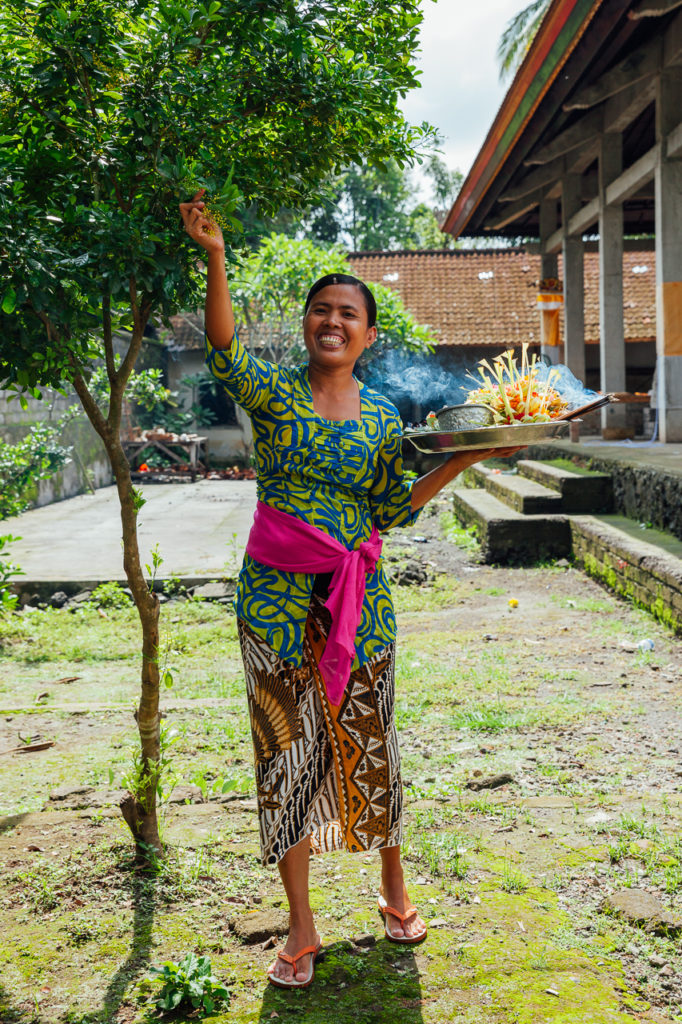 The Balinese woman with offerings at the temple, Ubud, Bali