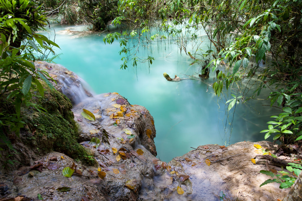 Amazing turquoise water of Kuang Si waterfalls, Laos