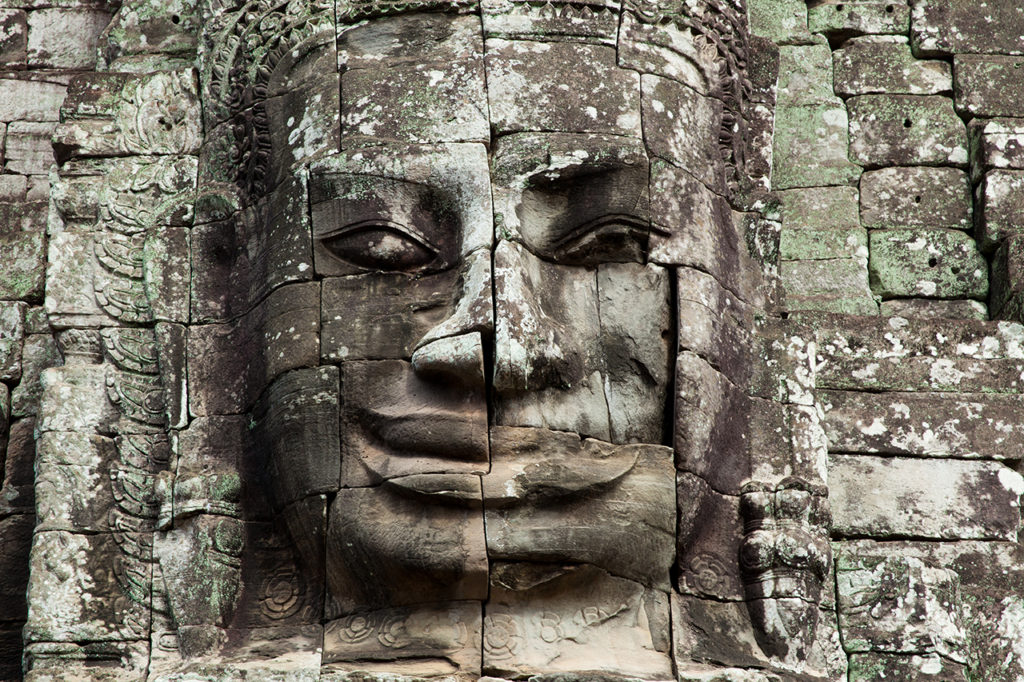 The stone face of on the wall of Bayon Temple