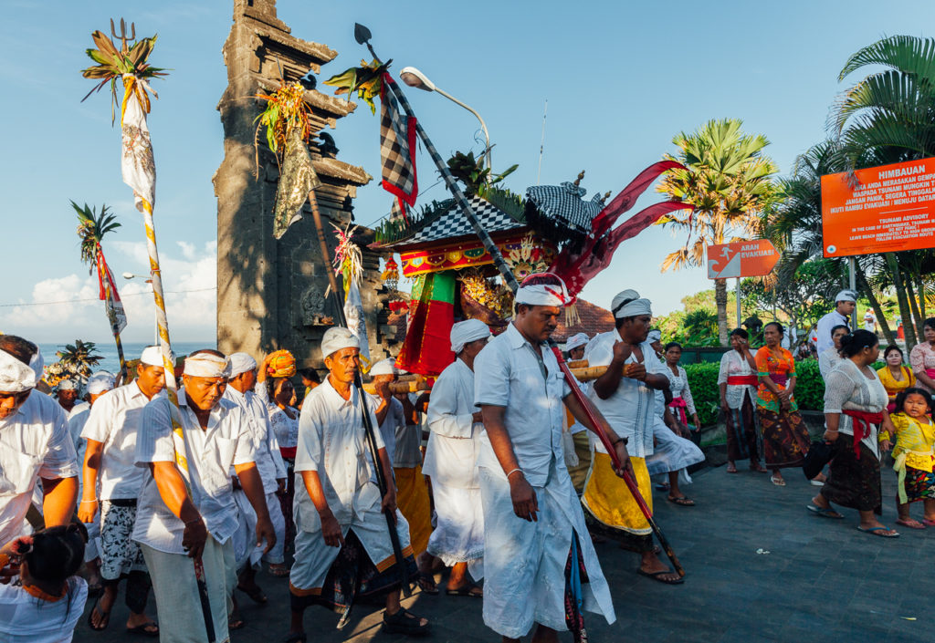 The religious procession during Balinese New Year (Nyepi) celebrations, Tanah Lot, Bali