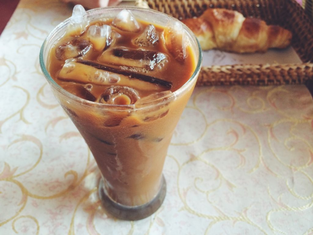 A coffee with a French croissant in a local cafe, Luang Prabang, Laos