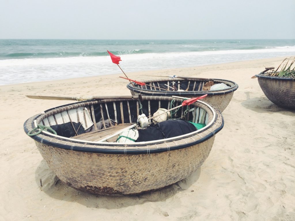 Hoi An, Vietnam: Traditional boats at the beach